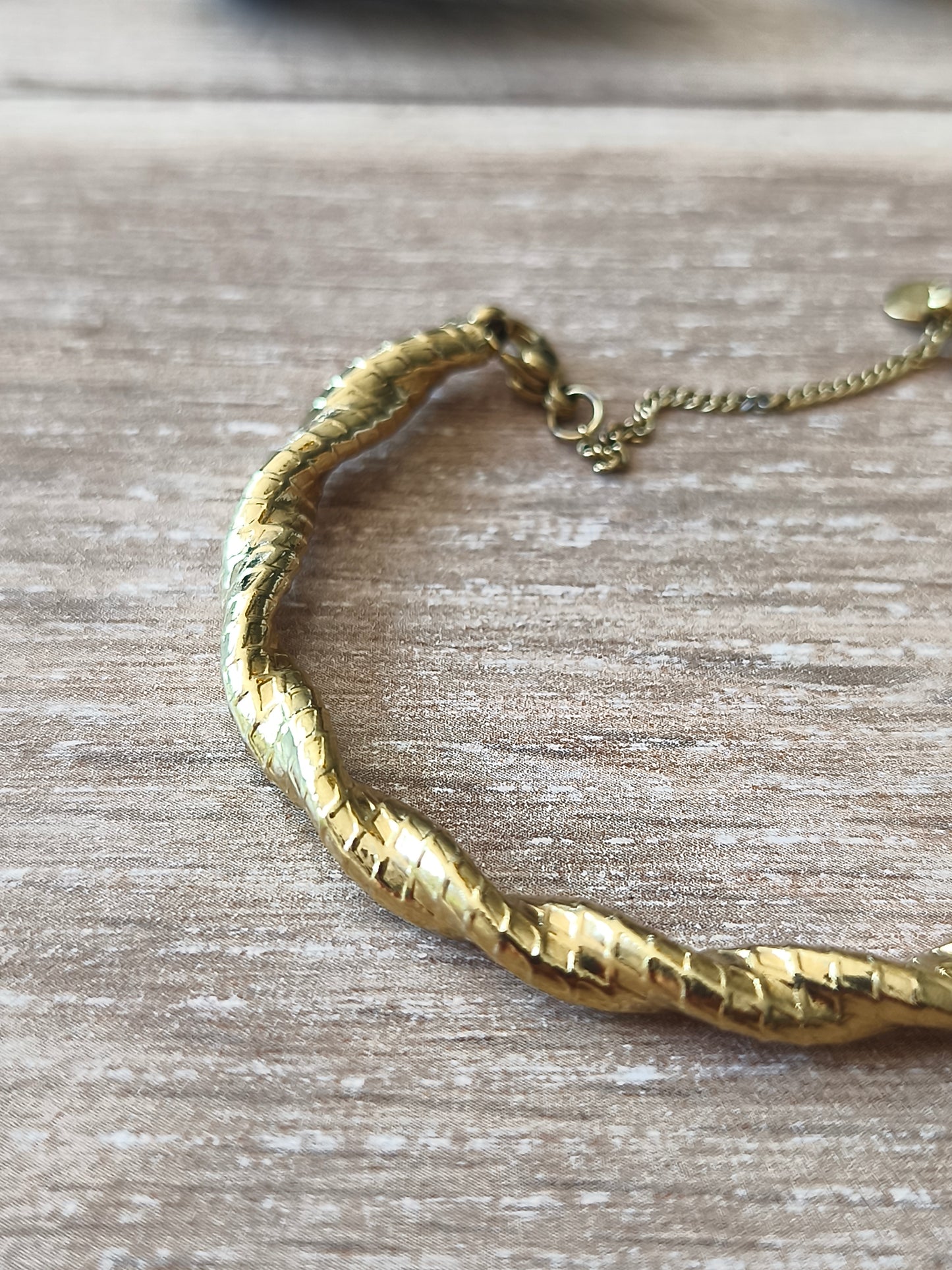 Bracelet torsadé doré