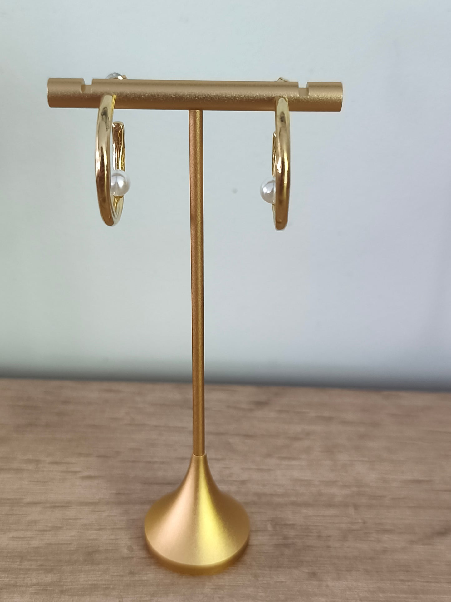 Boucles d'oreilles créoles avec perle