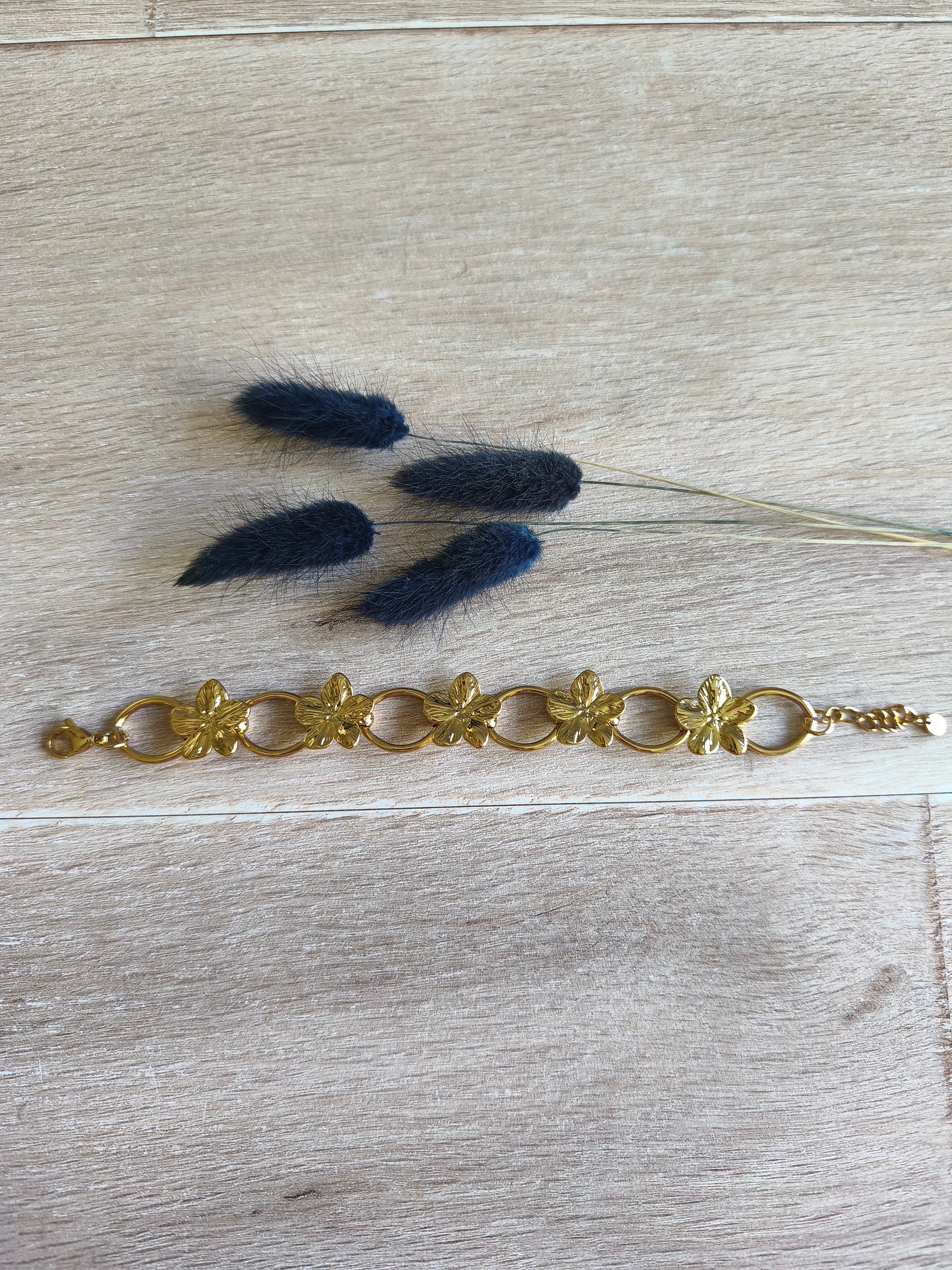 bracelet en acier inoxydable avec fleurs tropicales ou fleurs du bonheur, couleur doré