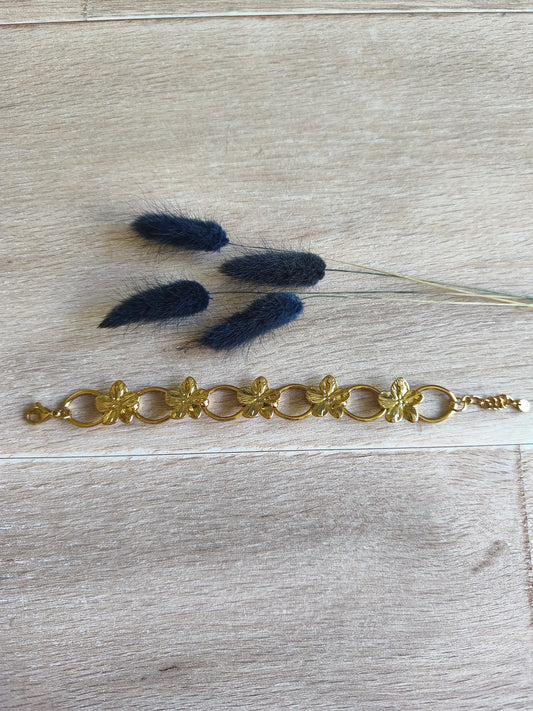 bracelet en acier inoxydable avec fleurs tropicales ou fleurs du bonheur, couleur doré