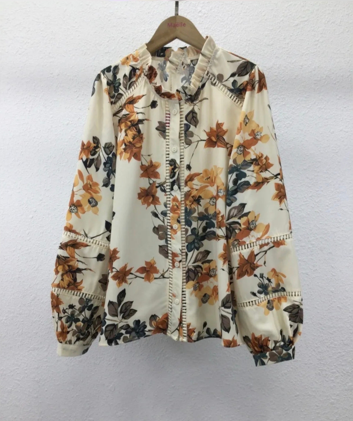 Blouse beige à fleurs
