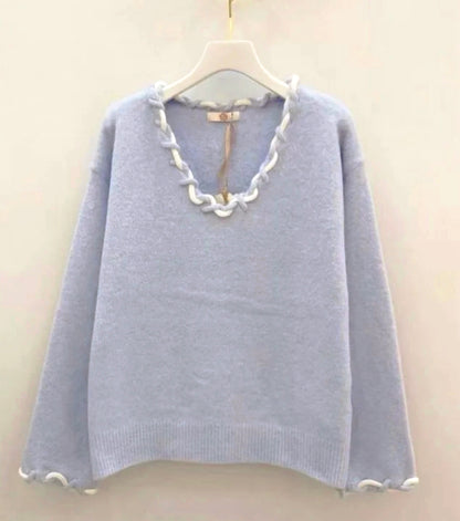 Pull bleu ciel à détails tressés