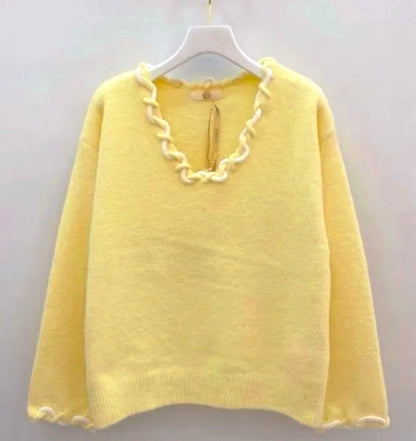 Pull jaune pastel à détails tressés