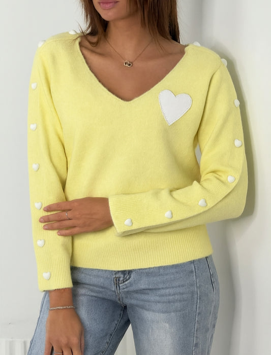 Pull jaune pastel à cœurs blancs